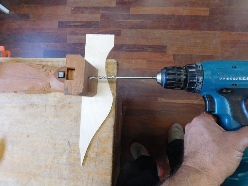 Drilling holes into heel 1.jpg