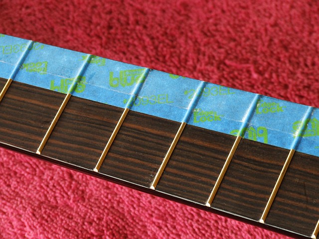 Taped fretboard.jpg